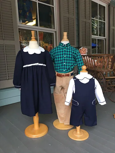 Navy scalloped dress, plaid button-down and navy shortall